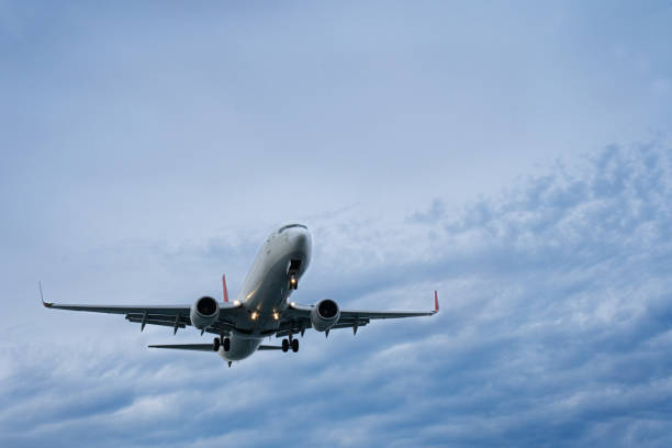 istock passenger plane coming in for a landing 2148510464