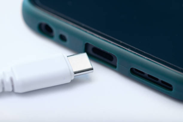 istock Phone charger, USB Type-C cable plugged into the smartphone input, close-up 2148512005