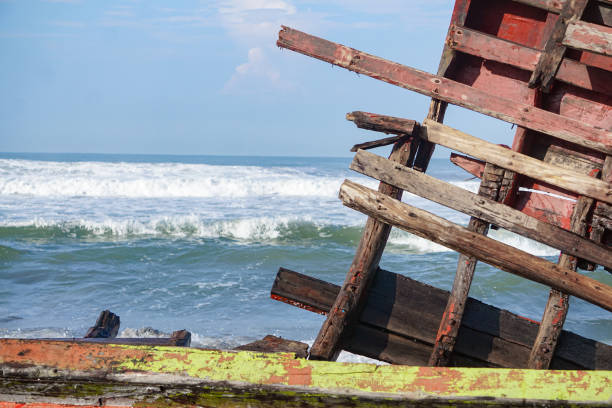 Wreckage on a sandy beach on a summer evening