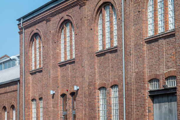 istock old window in a brick wall of an industrial old buiding 2148515661