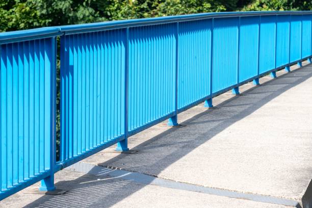 blue bridge railing in the sun