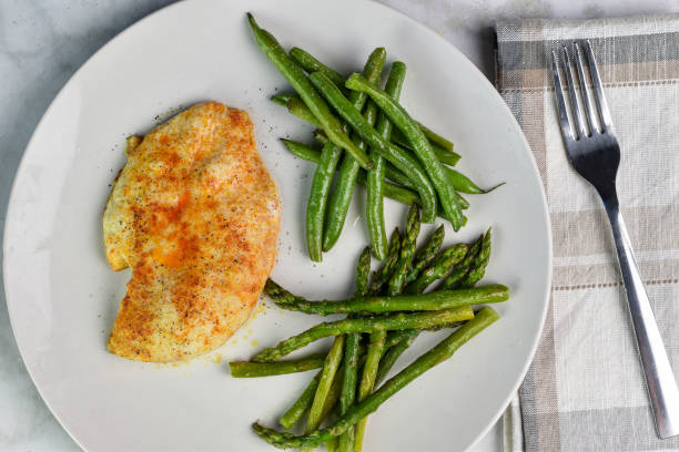 istock baked chicken  breast  with green beans and asparagus 2148517487