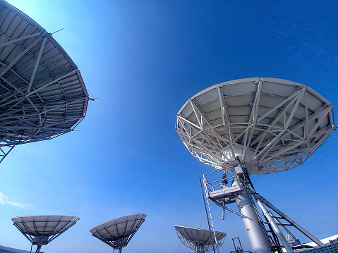 Collection of transmitting antennas and blue sky
