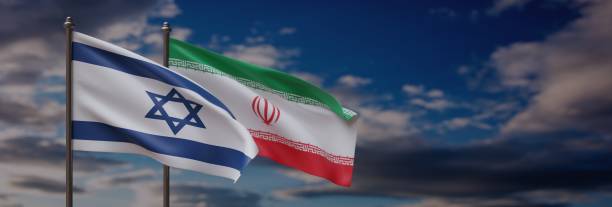 istock Israeli and Iranian flags displayed against blue sky with clouds, 3D render 2148518787