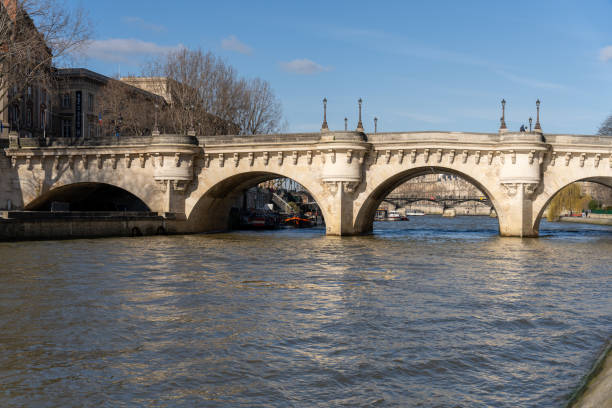 istock A bridge spans a river with boats on it 2148518900