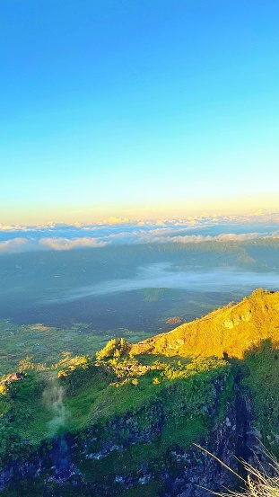Bali Indonesia - Apr 13, 2024: Morning picture of just arise sunrise from mountain peak