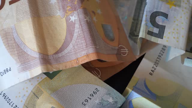 Close up of EURO money banknotes. Background with money EURO. Cash money background 4k