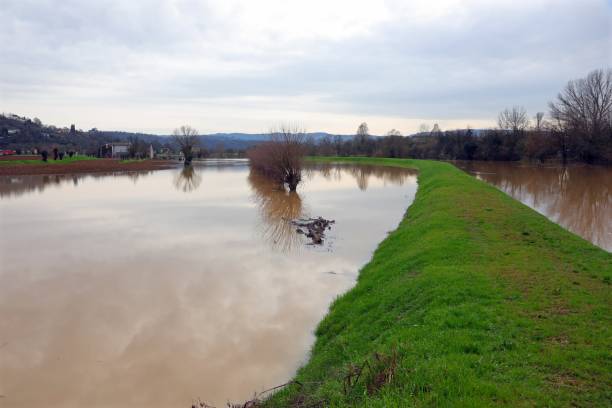 istock Floodwaters inundate fields after a river breaches its banks 2148523245