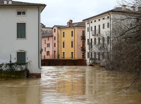 old Bridge and river called FIUME RETRONE in Vicenza City in northern Italy during flood