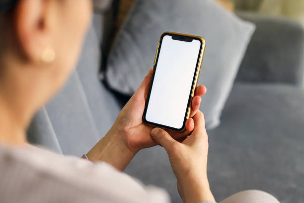 istock Old Woman Hands Holding Phone, Phone Blank Screen, Technology And People, Ordering, Online Shopping, Retirement 2148525072