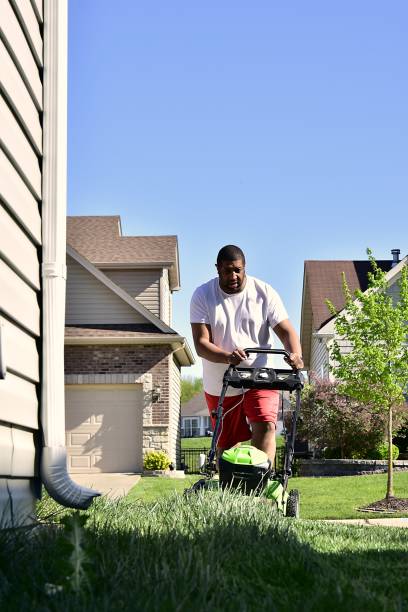istock African American Man Mowing Lawn 2148527435