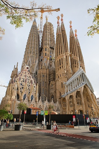 Barcelona, Spain - November 21, 2023: Facade of Sagrada Familia cathedral. Cathedral of La Sagrada Familia. It is designed by architect Antonio Gaudi and is being build since 1882