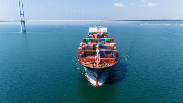 istock Aerial view of giant cargo container ship in transit. Front view of cargo container ship in transit in Izmit Gulf. 2148529940