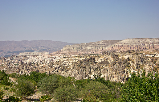 View of Cappadocia in summer time with Nazar and pitcher