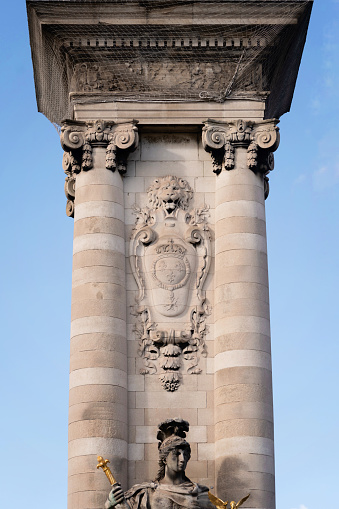Paris, France - October 1, 2022: Statue of La France De Louis on Pont Alexander. Sculpture on column of Alexandre Bridge