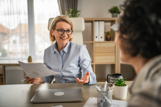 istock Two mature woman work and consult at office 2148534472