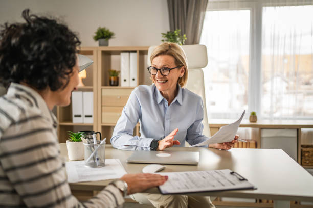 istock Two mature woman work and consult at office 2148534512