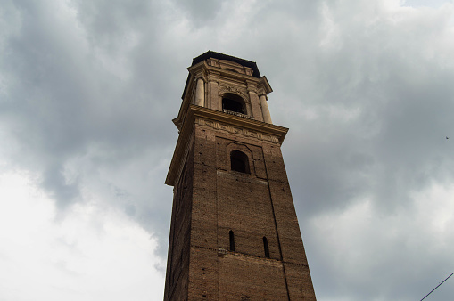 Tower of Turin cathedral and sky with clouds