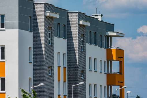 Closeup, fragment of modern residential architecture created of glass concrete and brick