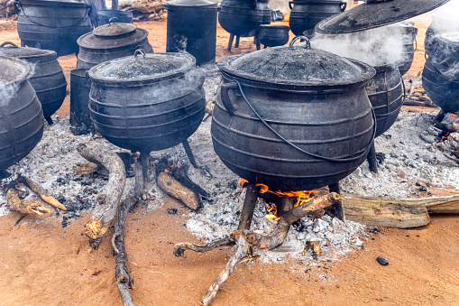 3 legged cooking pots cooking for an traditional event, outdoors kitchen africa
