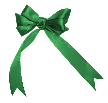 Green bow for decoration on isolated background, top view