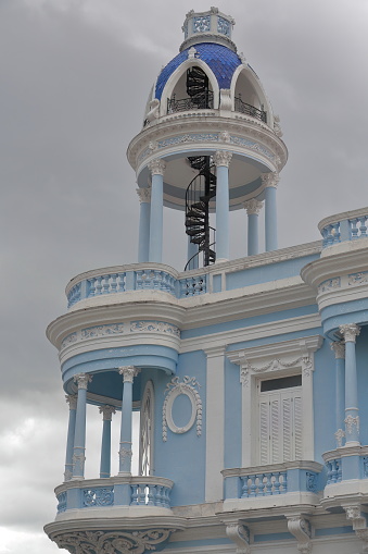 Cienfuegos, Cuba-October 11, 2019: Turret on the southwest corner -Calles San Fernando and Bouyon Streets intersection- of the AD 1918 built in Eclectic style former Ferrer Palace, now the Arts Museum