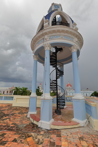 Cienfuegos, Cuba-October 11, 2019: Turret on the southwest corner -Calles San Fernando and Bouyon Streets intersection- of the AD 1918 built in Eclectic style former Ferrer Palace, now the Arts Museum