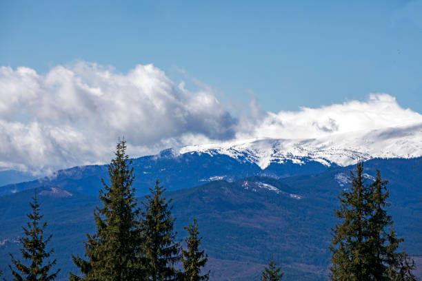 istock snowy peaks illuminated by the sun at a ski resort. leisure 2148539252