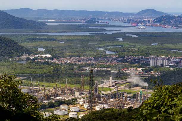 Cubatão Oil Refinery and Surrounding Landscape View from Parque Caminhos do Mar. Cubatao, Brazil - March 3, 2024: Cubatão Oil Refinery and Surrounding Landscape View from Parque Caminhos do Mar. cubatão stock pictures, royalty-free photos & images