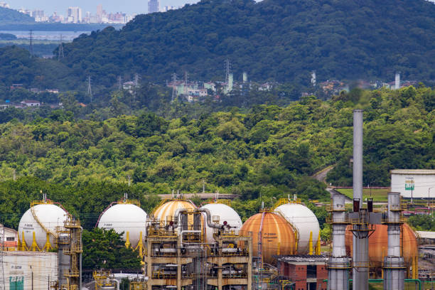 Storage Spheres and Industrial Structures Amidst the Greenery in Cubatão. Cubatao, Brazil - March 3, 2024: Storage Spheres and Industrial Structures Amidst the Greenery in Cubatão. cubatão stock pictures, royalty-free photos & images