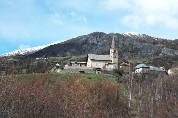 Saint-Paul-sur-Ubaye a commune in Haute Ubaye with its Saint-Pierre-et-Saint-Paul church rebuilt in the 17th century.\nThe photo is taken towards the northwest, towards the Col de Vars