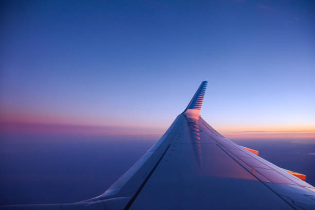 Sunrise flight over Patagonia, Argentina Sunrise flight on Argentine domestic flight above the Patagonian plains of South America wow airlines stock pictures, royalty-free photos & images