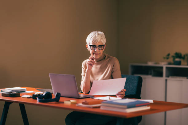 Professional Woman Working at Her Office Desk