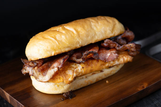 istock american bacon and eggs breakfast sandwich 2148544259