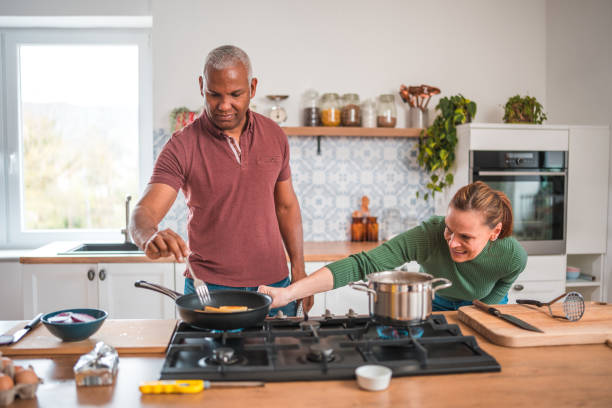 istock Handsome Mixed Race Couple Lunchtime Partnership 2148549487