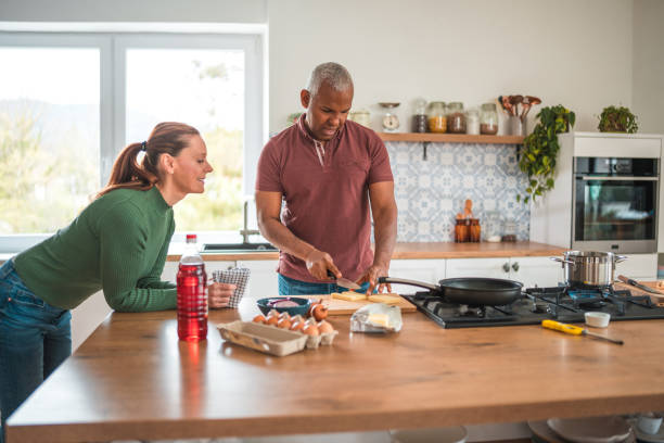 istock Mixed Race Married Couple Love in the Kitchen 2148549488