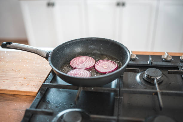 istock Red Onions On A Frying Pan 2148549499