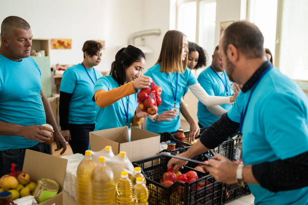 istock Packing and sorting emergency food donations 2148549535