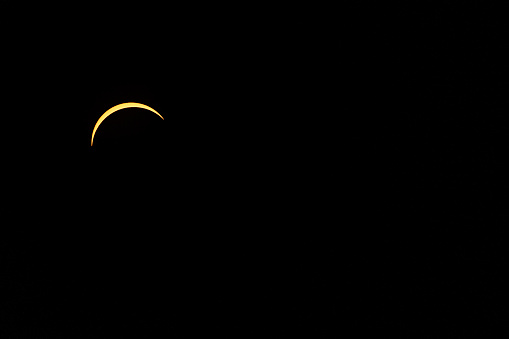 Sun appears as sliver, crescent-shape, as it approaches C2 phase of the 2024 Total Solar Eclipse; Indiana, USA