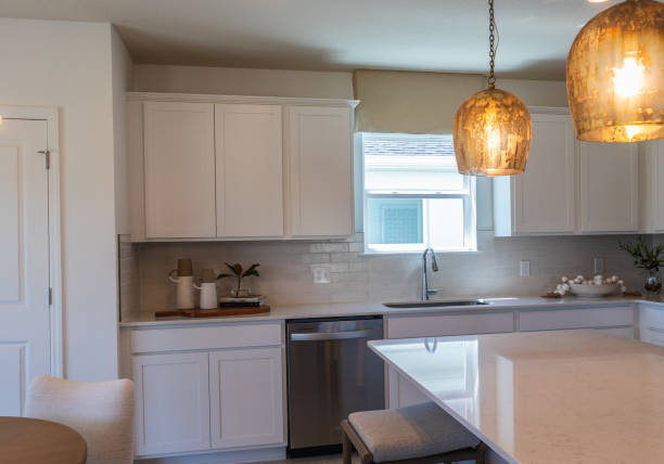istock cozy farmhouse style kitchen with white cabinets and countertop 2148551181
