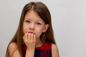 Child biting nails as concept of autoaggression
