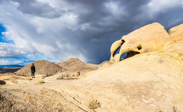 Female Hiker Near Cyclops Arch