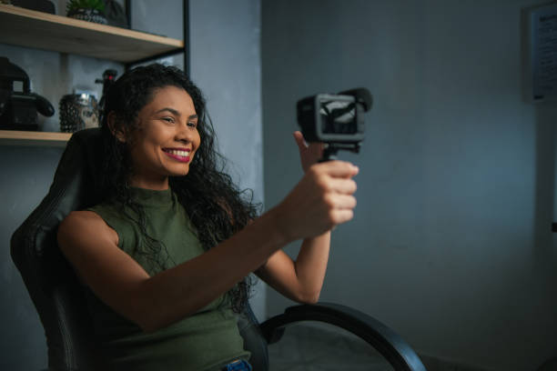 istock young latin woman creating videos for the internet 2148563805