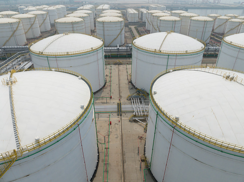 Gas storage tanks and containers seen in the commercial port of Barcelona