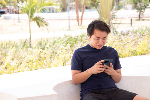 istock Hispanic teenager in tech-focused environment 2148564935