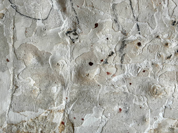 istock A wall with a lot of cracks and holes 2148567266