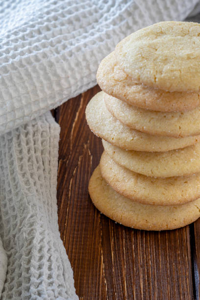 istock Delicious sugar cookies on wooden table, closeup 2148567541