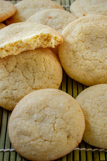 istock Delicious sugar cookies on wooden table, closeup 2148567574