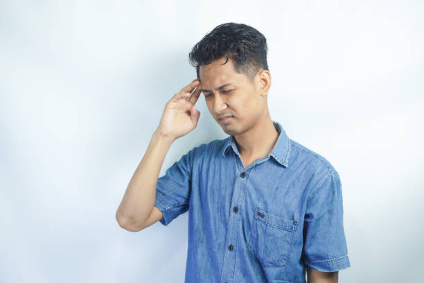 istock Young handsome man over isolated background suffering from headache desperate and stressed because pain and migraine. Hands on head. 2148567678