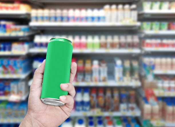 istock Hand hold mockup green aluminum can with many drinks on shelf  background 2148568266